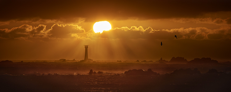 Sunset and light house
