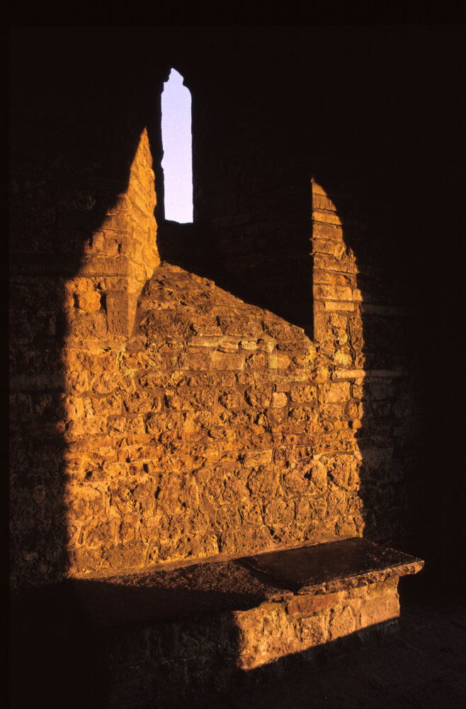 Low sun in St. Michael's chapel, Glastonbury Tor