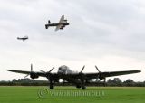 City of Lincoln and Spitfire flying over Just Jane
