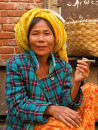 Market lady selling chickens in Burma