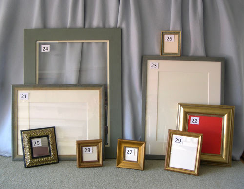 FIVE PHOTO FRAMES AND FOUR OTHERS