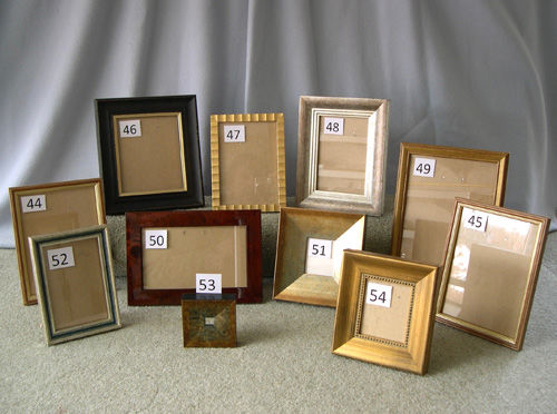 ELEVEN PHOTO FRAMES