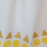 Circles Triangles (gold) tea towel