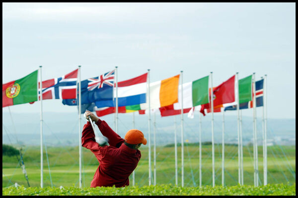 A golfer drives off during the Senior Master competiton at Royal Troon