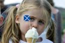 Little girl eating Arran Ice Cream