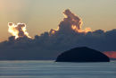 A dramatic sky forms behind Ailsa Craig as the sun sets