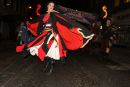 A dancer leads the St Andrew's great Tartan Turnout in Ayr