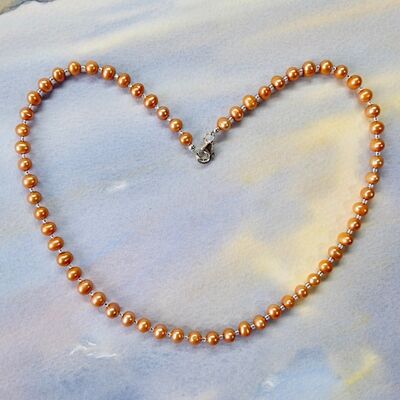 Roundish Pearls with Sterling Silver Clasp £39