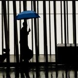 21 MAN WITH A BLUE UMBRELLA by Richard Burt