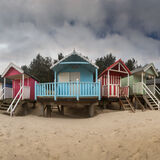 First LANDSCAPE - OVERWINTERING BEACH HUTS by Roger Green