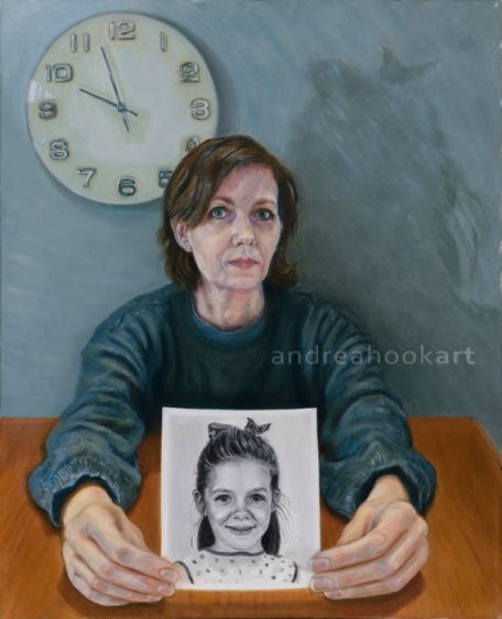 A double portrait of a woman holding a black and white photo of herself as a girl