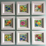 Nine framed miniature wildflower paintings Nine miniature wildflower paintings - framed in white wood.