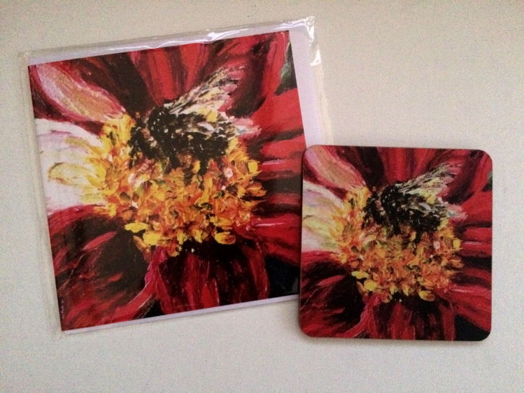 Buff-tailed Bumble bee on red dahlia coasters