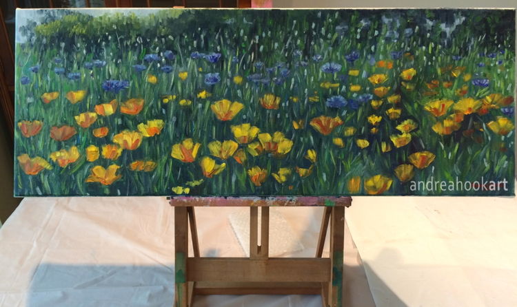 Yellow & Blue wildflower impasto painting on a tabletop easel
