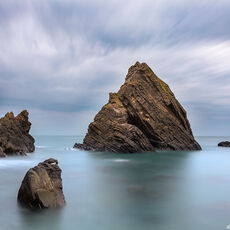 Mouthmill High Tide large rock formations in the sea at dawn