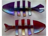 Fused and slumped iridised fish bowls
