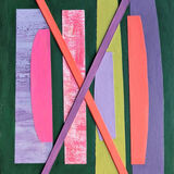 Asylum or Exile<br>mixed media on card<br>32 x 25 cms<br>2025 Abstract collage with 7 vertical stripes in lilac pink yellow-green red and purple on a dark green background and a cross on top.