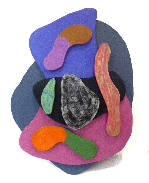 an irregular rounded shape base in mid grey with 3 smaller pieces in royal blue, black and pink on which are serpent -like shapes iin constrasting colours.