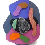 an irregular rounded shape base in mid grey with 3 smaller pieces in royal blue, black and pink on which are serpent -like shapes iin constrasting colours.