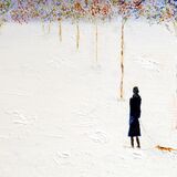 GIRL AND DOG WALKING IN THE SNOW