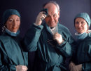 SURGEON WITH THEATRE NURSES