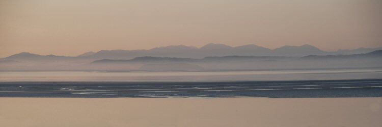 morecambe bay towards the lakeland hills in mist