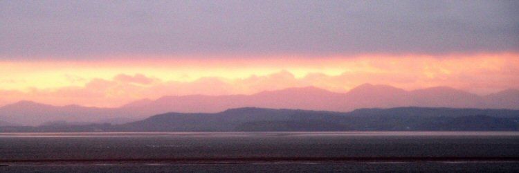 morecambe bay towards the lakeland hills at sunset