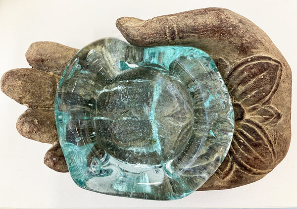 Carved Hand with glass T light holder