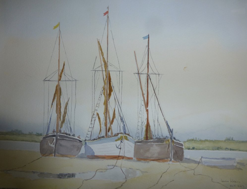 Barges on the mud by Laurie Hearn