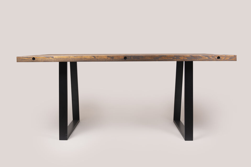 Rustic dining table with trapezium legs