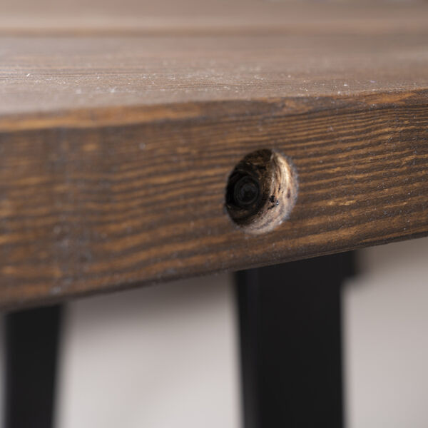 Close-up of Dining Table - Support goes through close up of table with trapezium legs showing steel rod going through