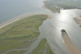 Airial view of Burnham Overy Harbour the East end of Scolt Head Island and Gun HIll