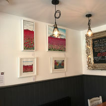 Becca's paintings in Natter Cafe in Farncombe