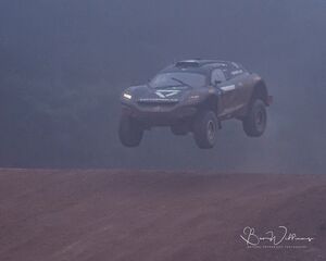 Jamie Chadwick bursting through the fog