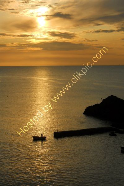 Golden Sunset and Fishing Boat
