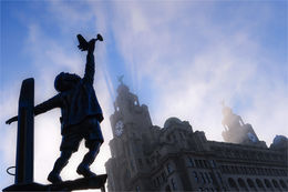 Boy & Plane sculpture below the Liver Building