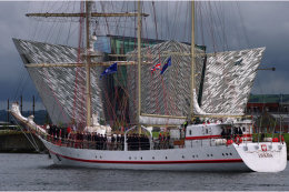 ORP Iskra sailing past Belfast Titanic Museum