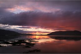 Sunset through the rain over Carlingford Lough
