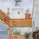 Southwold lighthouse through the rooves