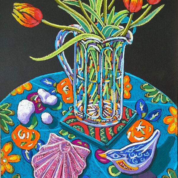 tulips in a glass jug