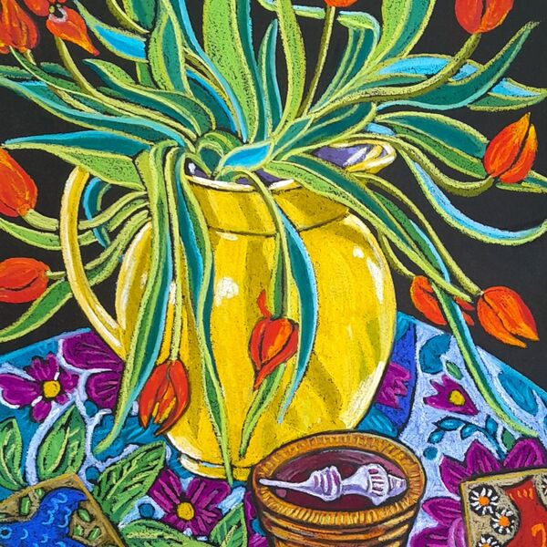 tulips in a yellow jug
