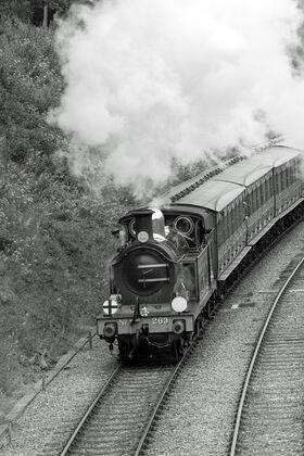 H Class 4-4-0 Tanks engine leaving Horsted Keynes