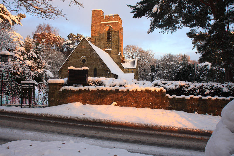 Christmas Card: Christ Church Fairwarp bathed in golden light