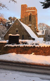 Christmas Card: Christ Church Fairwarp bathed in golden light