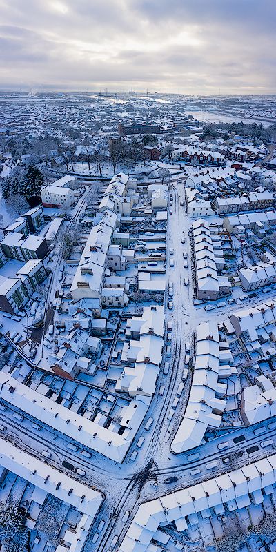 Snowy Newport with cathedral and transporter bridge, Wales, UK