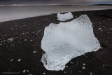 Ice On Black Sand