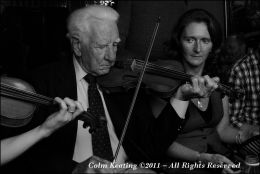 Ben Lennon playing in Donal's, Strokestown with Sinead Nic Dhonncha.