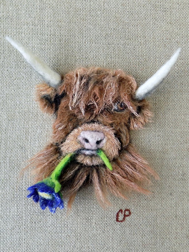 Highland Cow with Flower