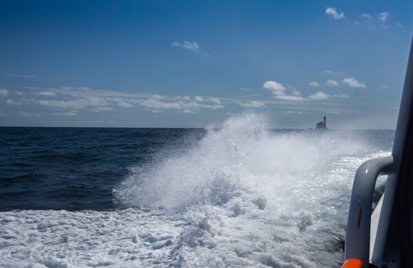 The Fastnet Rock coming into view through the spray.