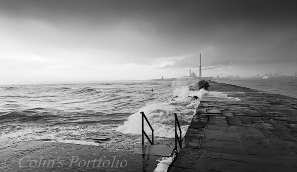 Southern breakwater on a breezy winter's day facing towards the city.